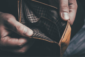 Hands holding an opened empty wallet
