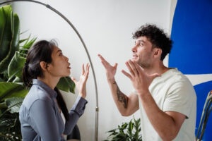 Two people arguing in an office