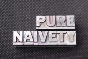 the word pure nativity written in metal letterpress type on a black background