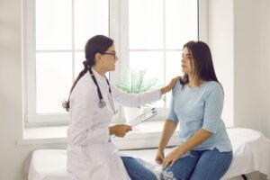 a person is being examined by a doctor