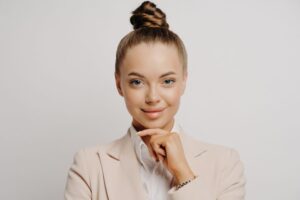a person in a business suit posing for the camera